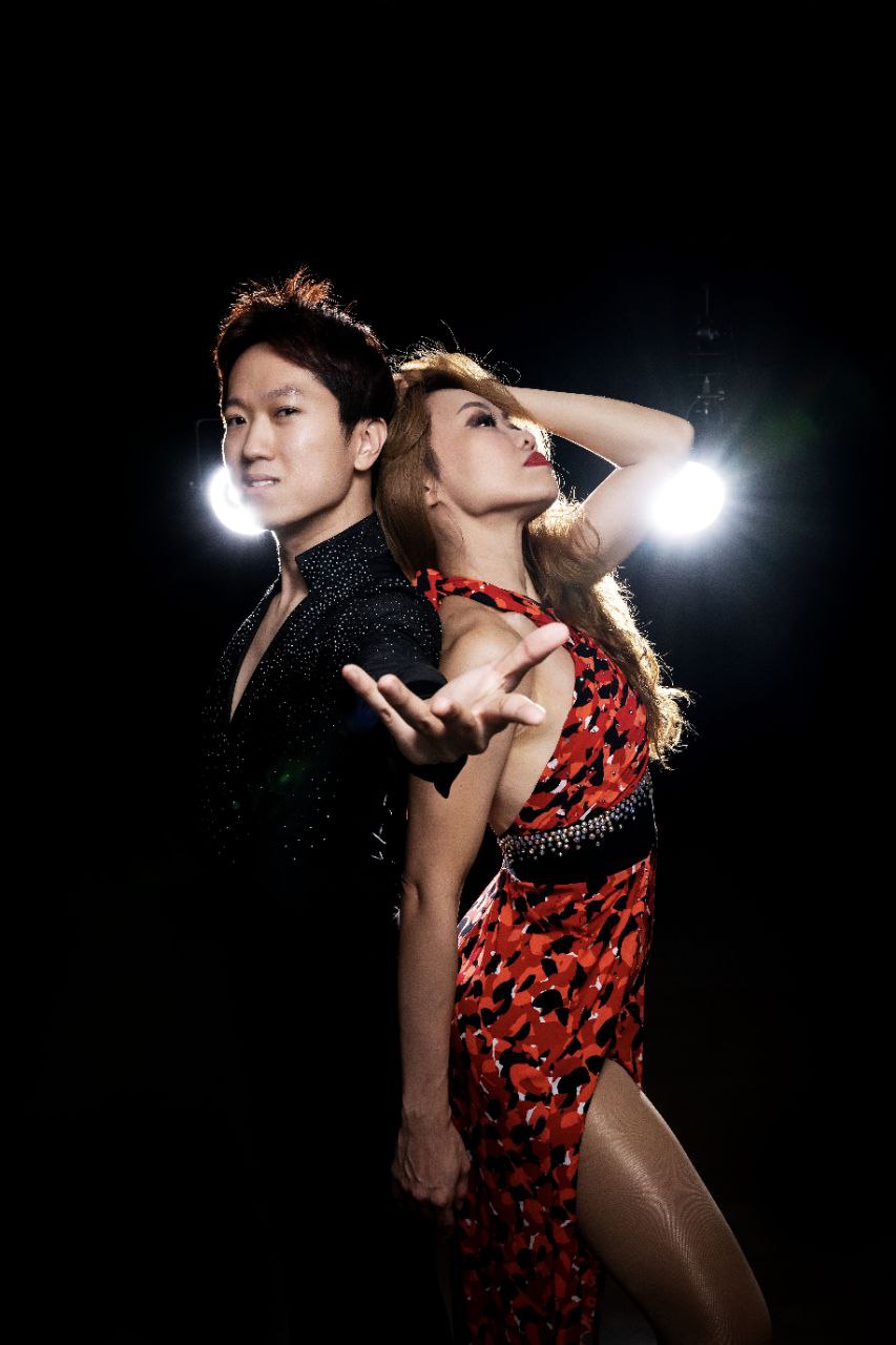 Nick and Vivi in bachata performance costume